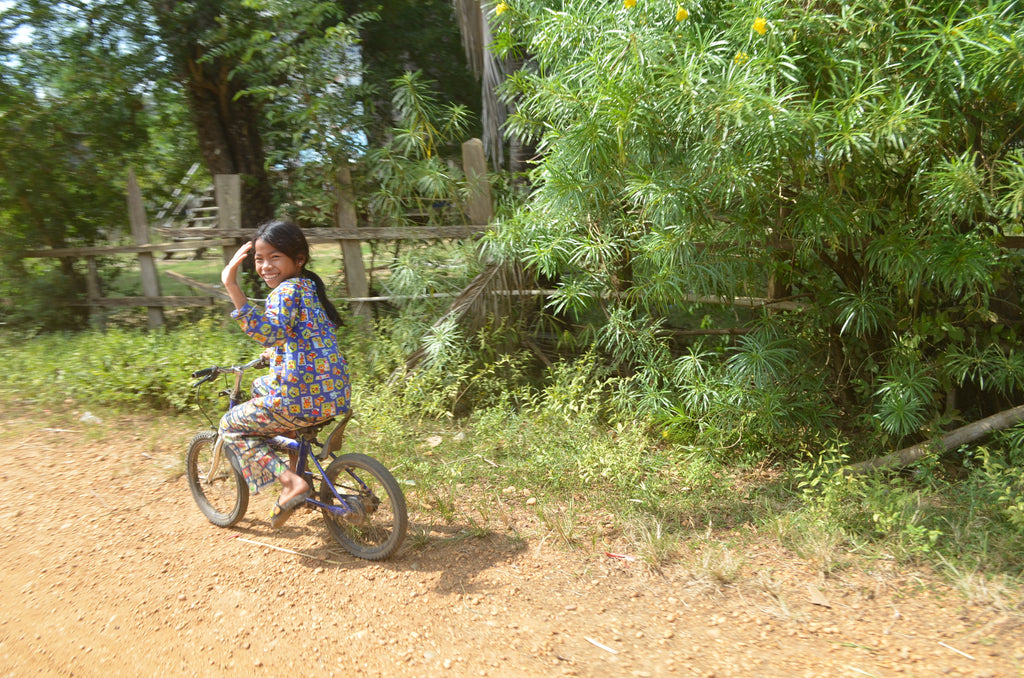 Child Cycling During Cambodia Volunteer Trips